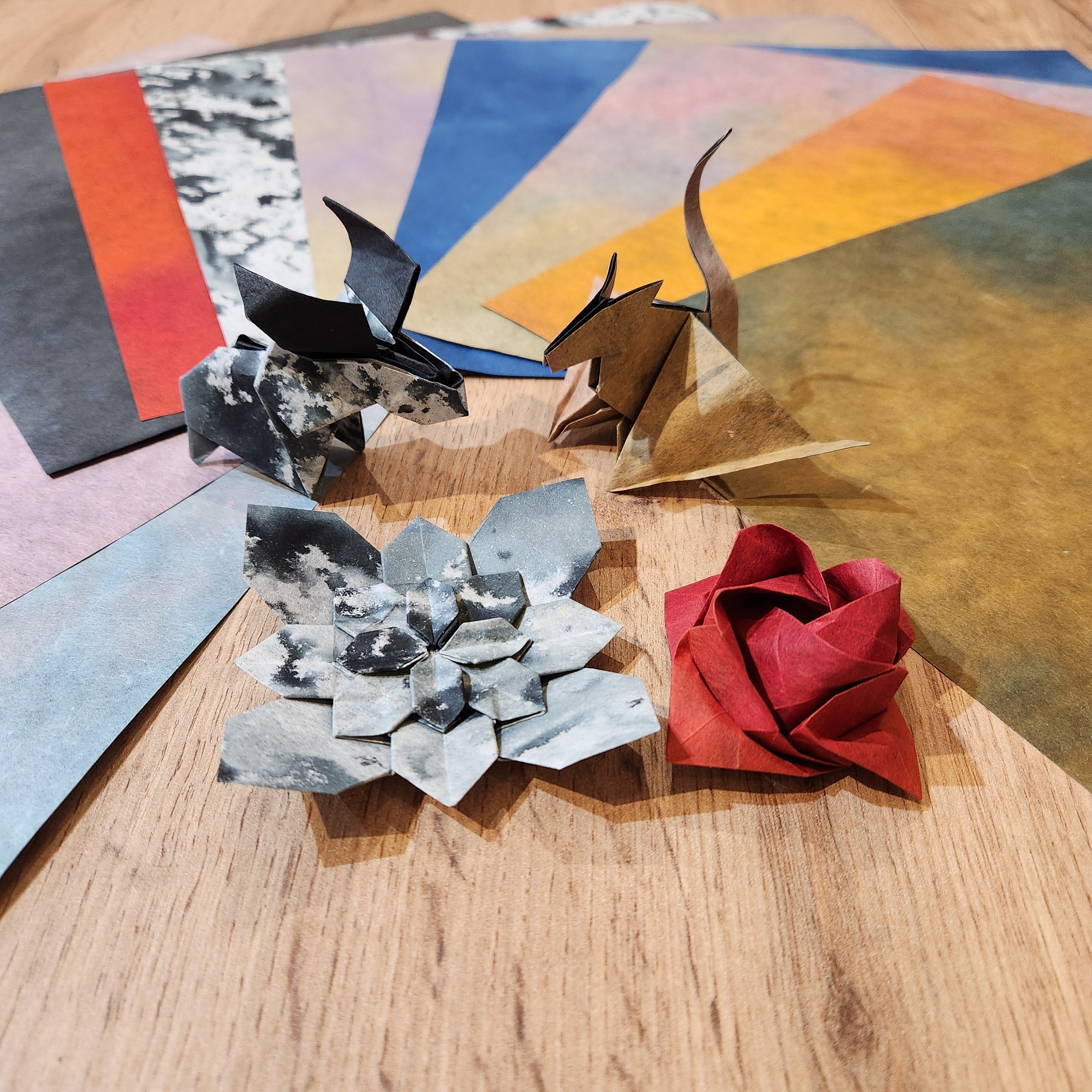 Duo ombre paper 12 inch square sheet with gradient color blend on one side and solid black reverse